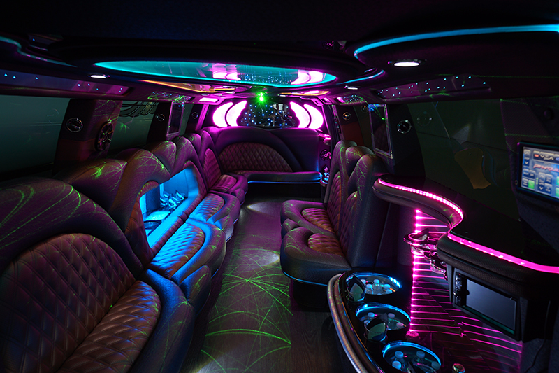 Party bus fiber optic lighting and cup holders